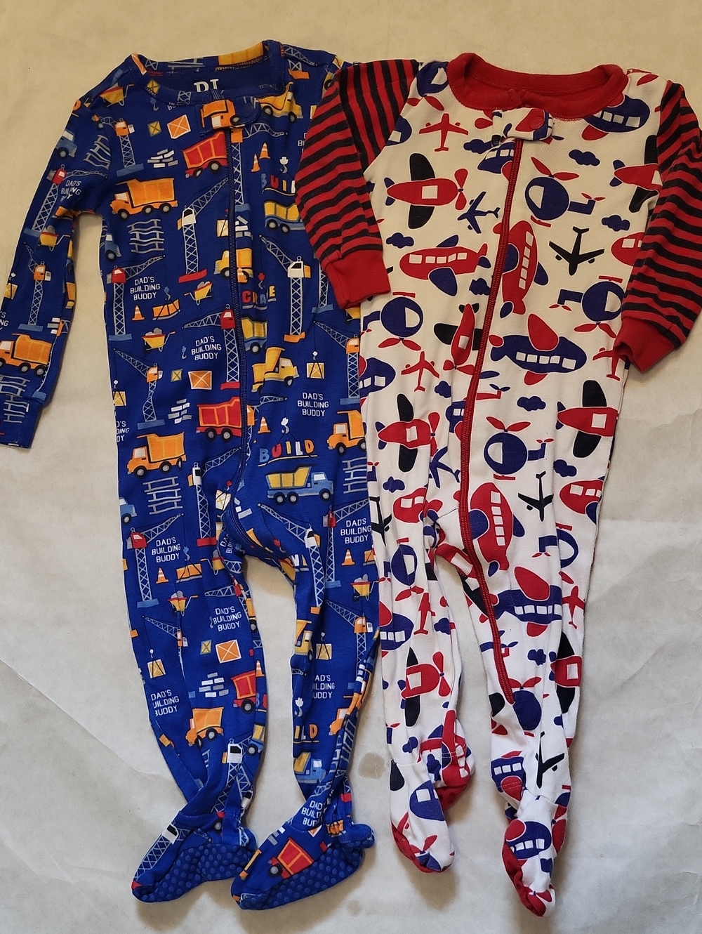 Two snug fitting footed sleepers/footies